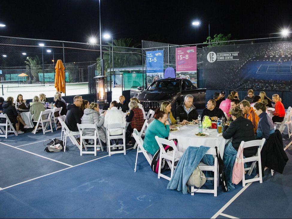 Guests dining courtside at Elsternwick Park Tennis Centre